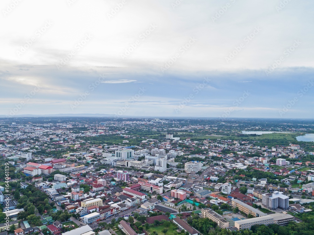 Top view from drone camera : Sunset time on city scape, 
Beautiful city at twilight sky clouds, Khonkaen Thailand.