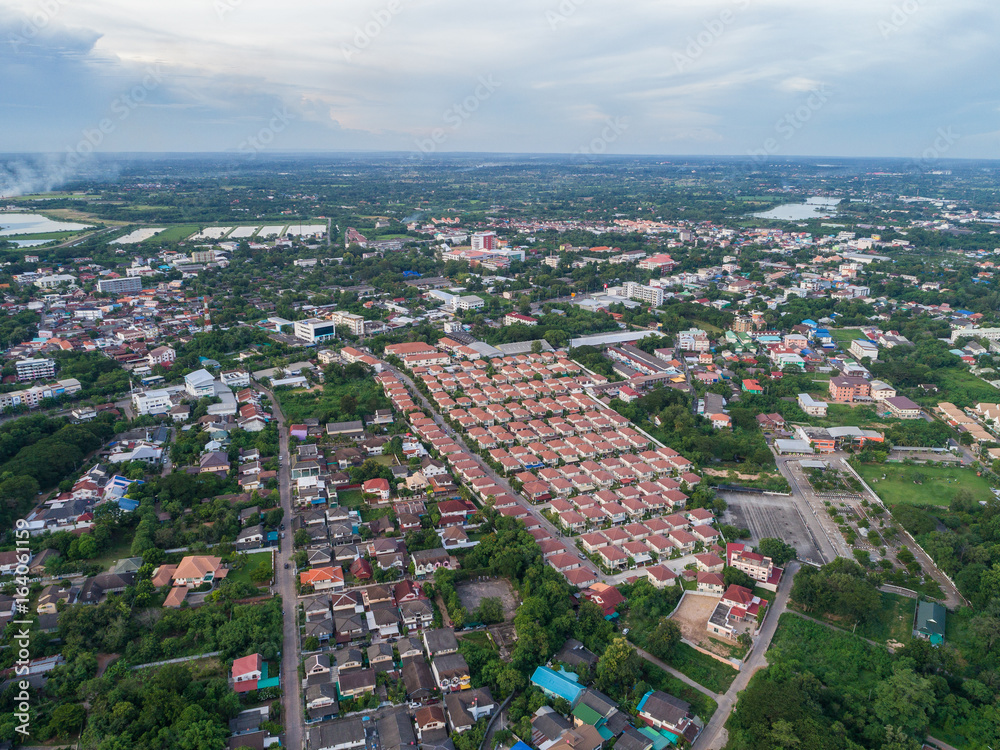 Top view from drone camera : Sunset time on city scape, 
Beautiful city at twilight sky clouds, Khonkaen Thailand.