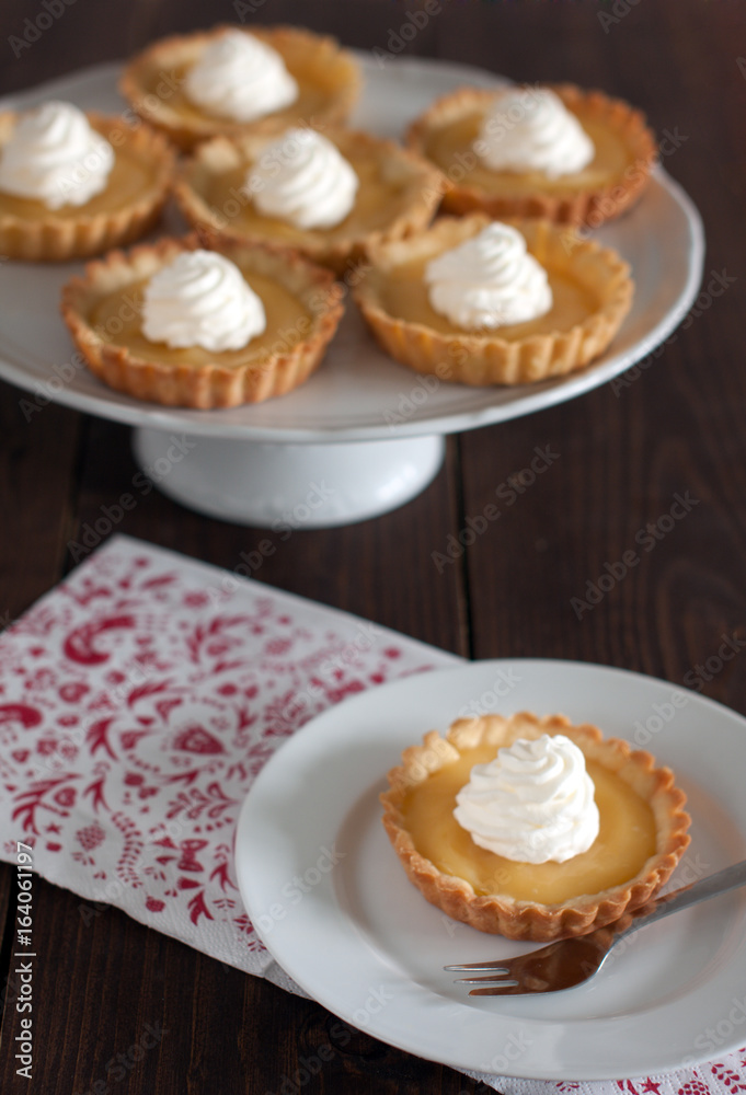 Tartelettes with lemon curd and cream Tartelettes with lemon curd and cream