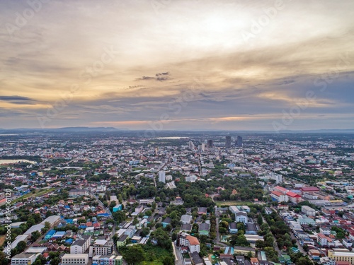 Top view from drone camera : Sunset time on city scape, 
Beautiful city at twilight sky clouds, Khonkaen Thailand. photo