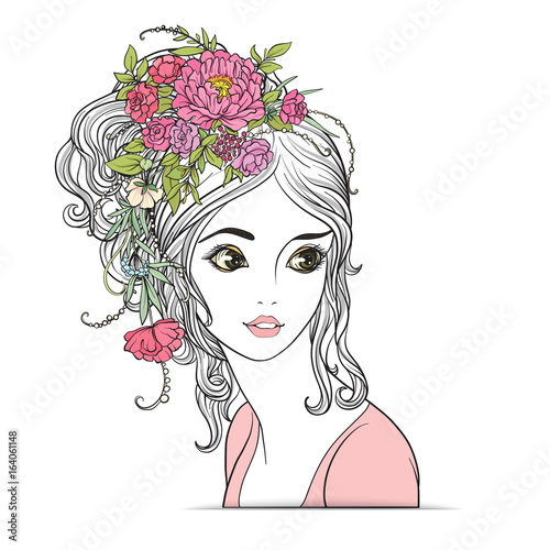 A young beautiful girl with a flower wreath on his head. 