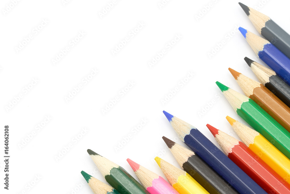 Close up macro shot set of color pencils for school or professional use on white background, copy space Close up macro shot set of color pencils for school or professional use on white background, copy space