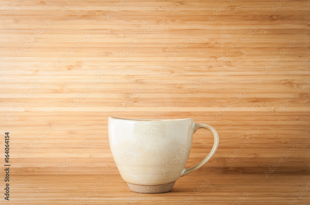 Coffee mug on wooden table. Coffee mug on wooden table.