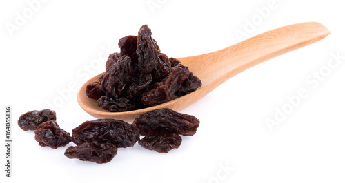 Dried raisins on a white background