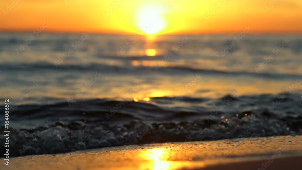 Sand And Waves On Sunset Beach