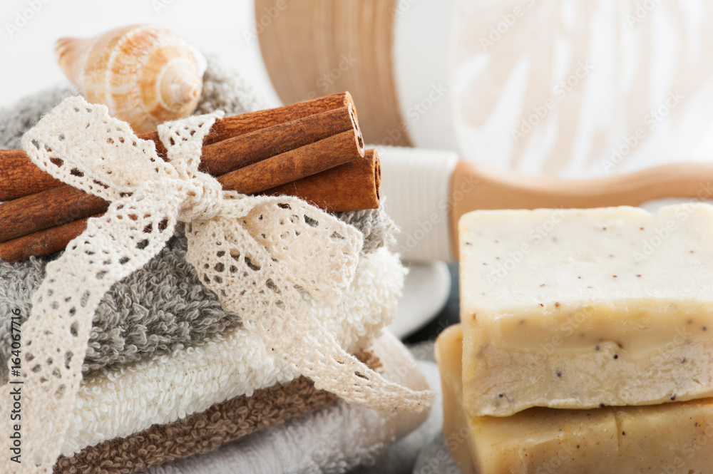 Spa composition with towels, cinnamon, soap