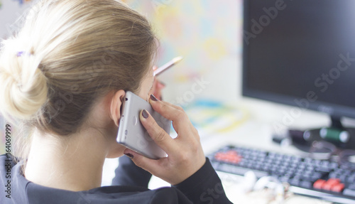 Wallpaper Mural Business woman working and talking on the phone Torontodigital.ca