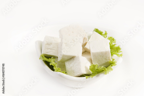 Piece of Cheese or Paneer Isolated on A White Background