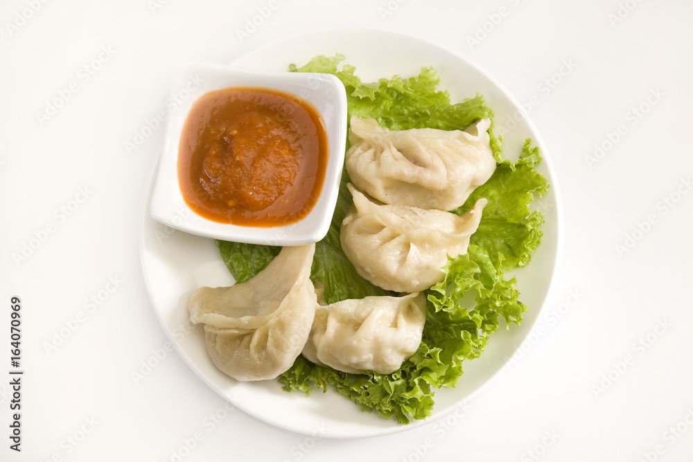 Traditional Dumpling Momos Served With Tomato Sauce