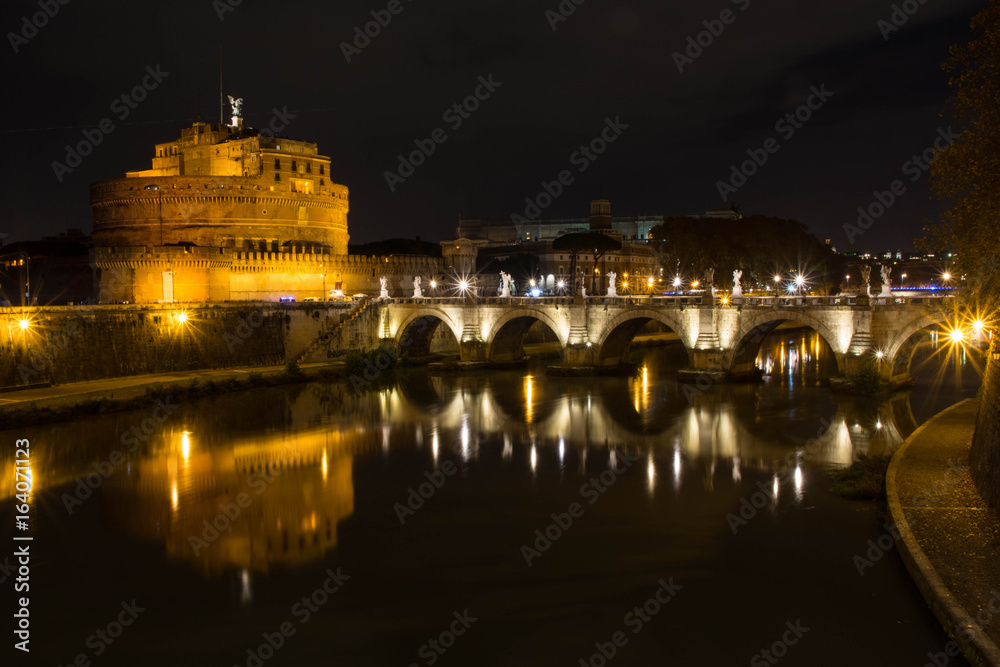 Castel sant'angelo with bridge shot at night 