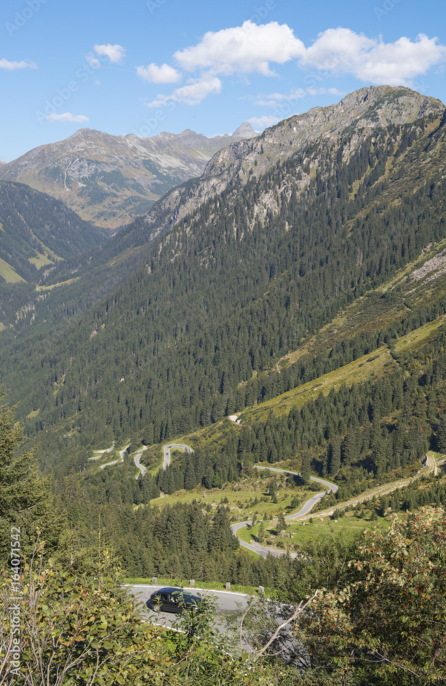 Road crosses a landscape of mountains in Austria (Grossglockner)