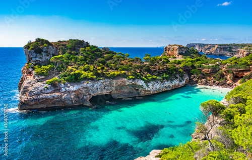 Stampa su tela Picturesque seascape on Majorca island, view of the idyllic bay beach Cala Moro,