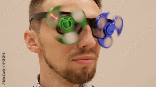 younge man with the spinner glasses photo