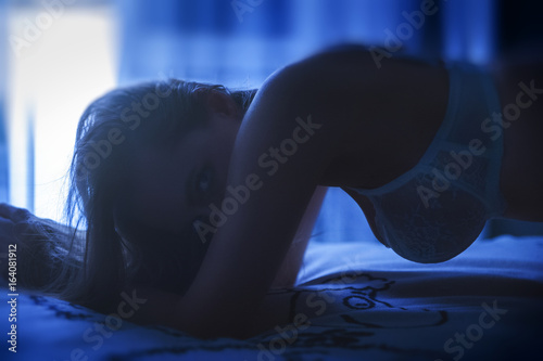 Woman portrait in the dark room
