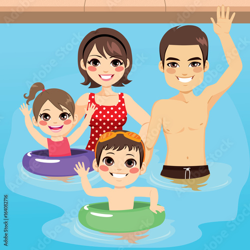 Cute young family happy together at swimming pool