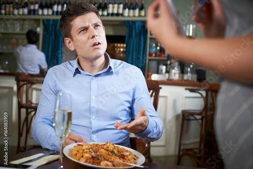 Photos Customer In Restaurant Complaining To Waitress About Food