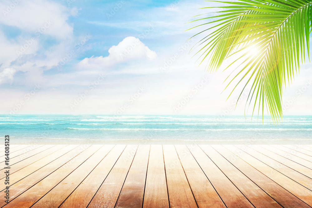 old wood table top on blurred beach background with coconut leaf ...