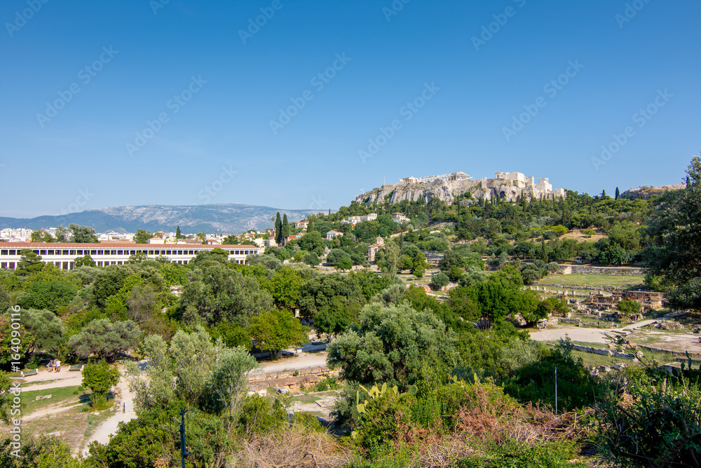 Ruins of the ancient Agora (Forum) of Athens with Acropolis in the background