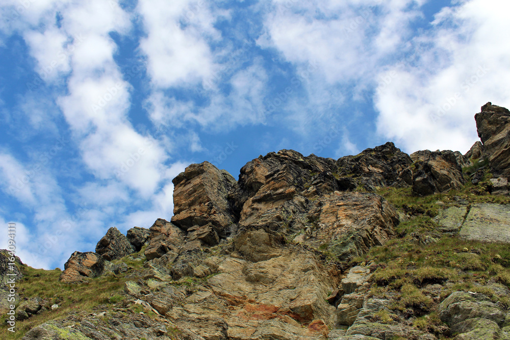 Fototapeta premium Rocks against blue sky in the mountains