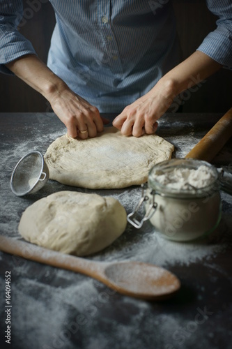 Cooking pizza dough.