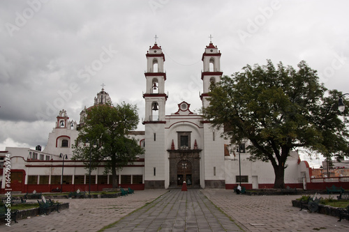 cloudy church in Puebla, Mexico photo