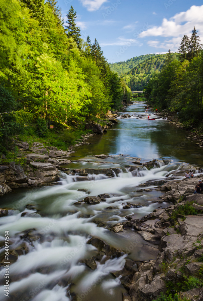 background landscape with waterfall in Yaremche vilage in Ukraine background landscape with waterfall in Yaremche vilage in Ukraine