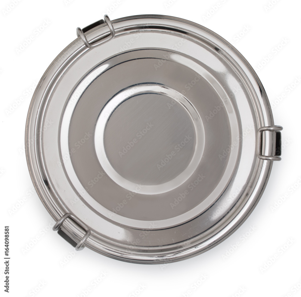 Silver, chrome or nickel metal round box, container for food with closed cover and latches isolated on a white background, top view.