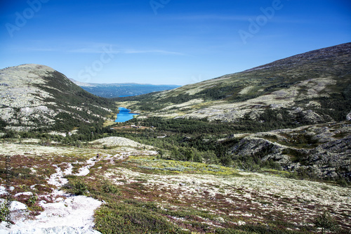 View of rondane national park with moutains and lake