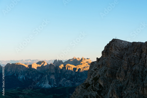 Sunrise at the top of dolomite mountain peaks