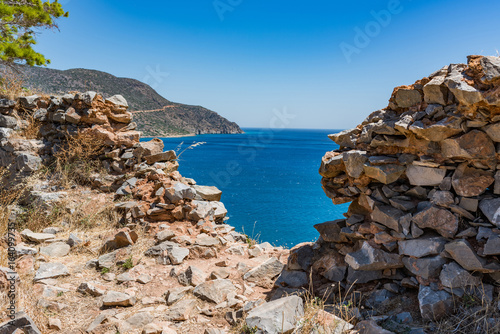 Top of Spinalonga island. View through ruins to blue aegian sea and Kalydon island. photo