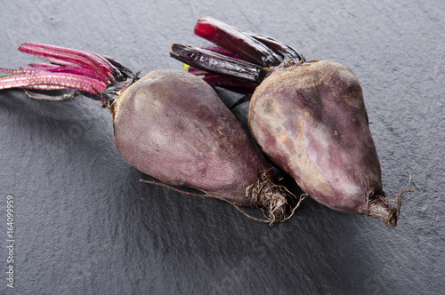 Red beetroot on a wooden stand photo