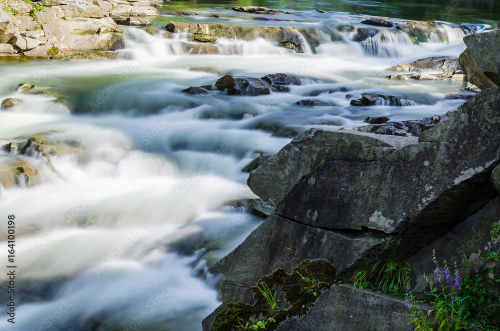 background landscape with waterfall in Yaremche vilage in Ukraine background landscape with waterfall in Yaremche vilage in Ukraine