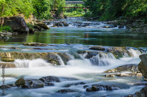 Fototapeta Naklejka Na Ścianę i Meble -  background landscape with waterfall in Yaremche vilage in Ukraine