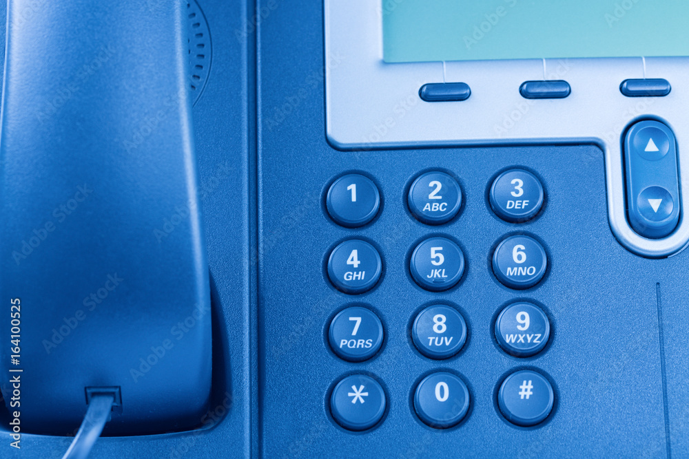 Modern IP digital phone details. Blue toned Modern IP digital phone details. Blue toned