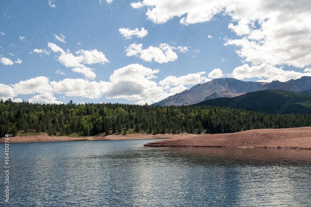 Lake at Pikes Peak with forest and mountains