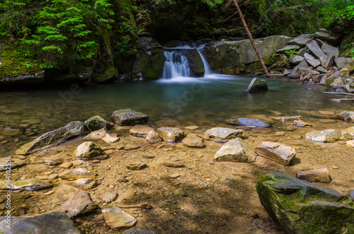 background landscape with waterfall in Yaremche vilage in Ukraine