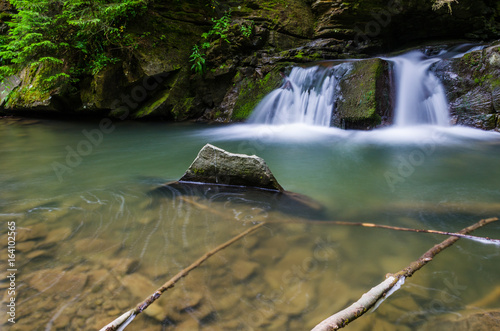 Fototapeta Naklejka Na Ścianę i Meble -  background landscape with waterfall in Yaremche vilage in Ukraine