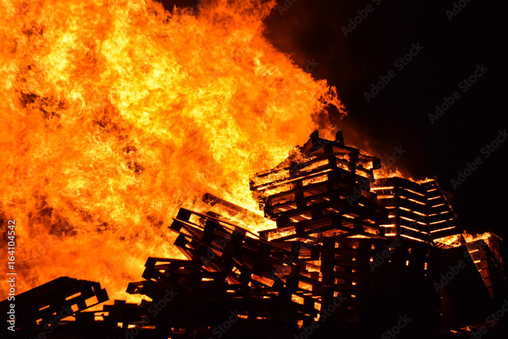 Wooden pallets on a burning bonfire