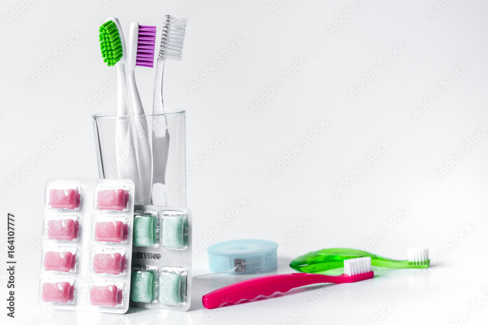 toothbrushes in glass on white background tools for oral care toothbrushes in glass on white background tools for oral care