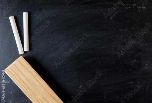 close up of a black dirty chalkboard, ecucation and back to school concept photo