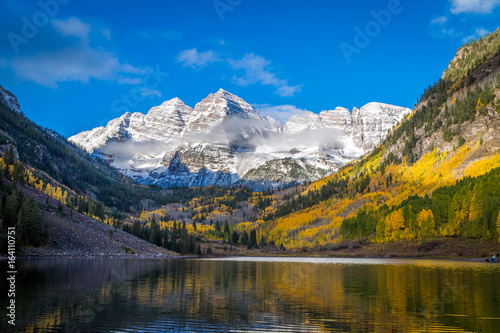 Maroon Bells and Early Morning Fog on a Crisp Fall Morning photo