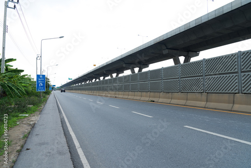 Blank road destination sign on highway