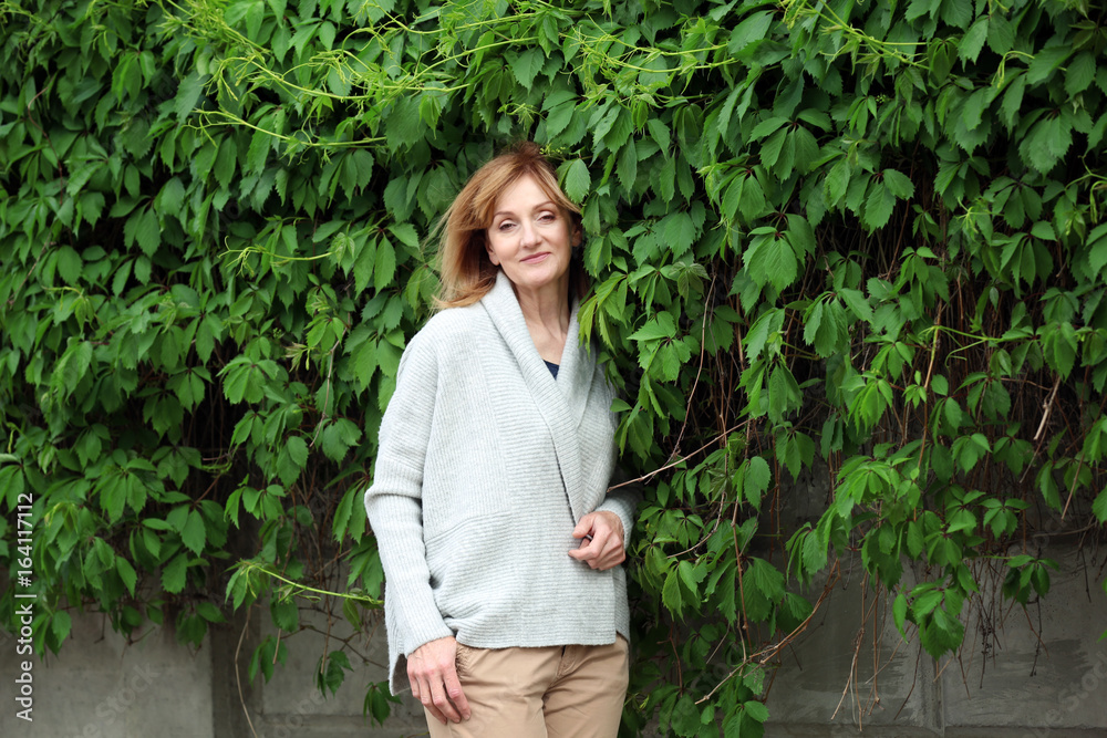 Portrait of attractive mature woman outdoors Portrait of attractive mature woman outdoors