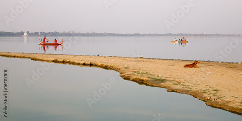 Wooden boats on the lake in Mandalay, Myanmar photo