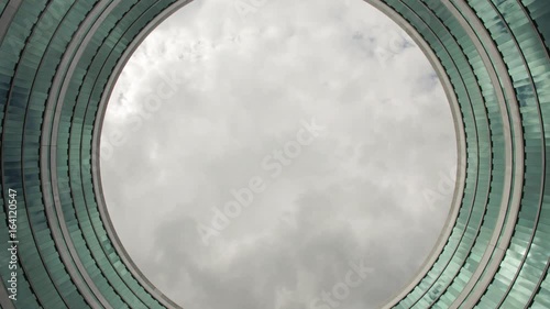 Cloudy Sky Time Lapse Through Circular Facade