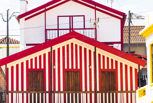 Typical small wooden houses with colorful stripes in Costa Nova. Aveiro. Portugal.