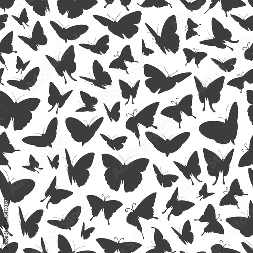 Flying butterflies silhouettes seamless pattern