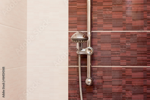 Close up of rain shower head in the bathroom.