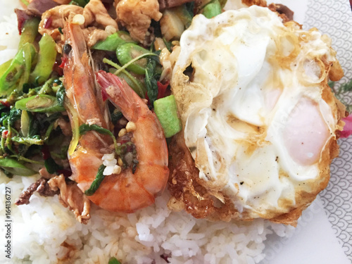fried shrimps and pork with chilli paste and basils  rice and fried egg topping