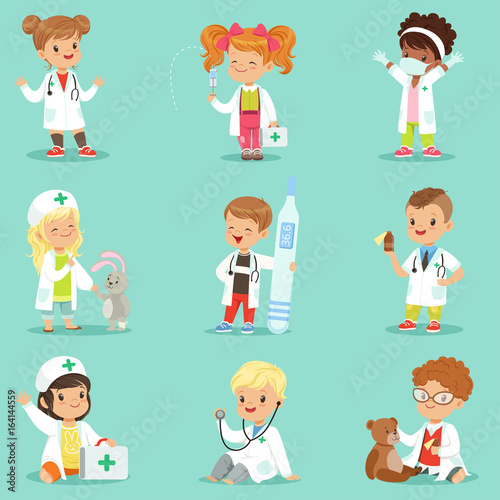 Adorable kids playing doctor set. Smiling little boys and girls dressed as doctors playing with toy medical equipment vector illustrations